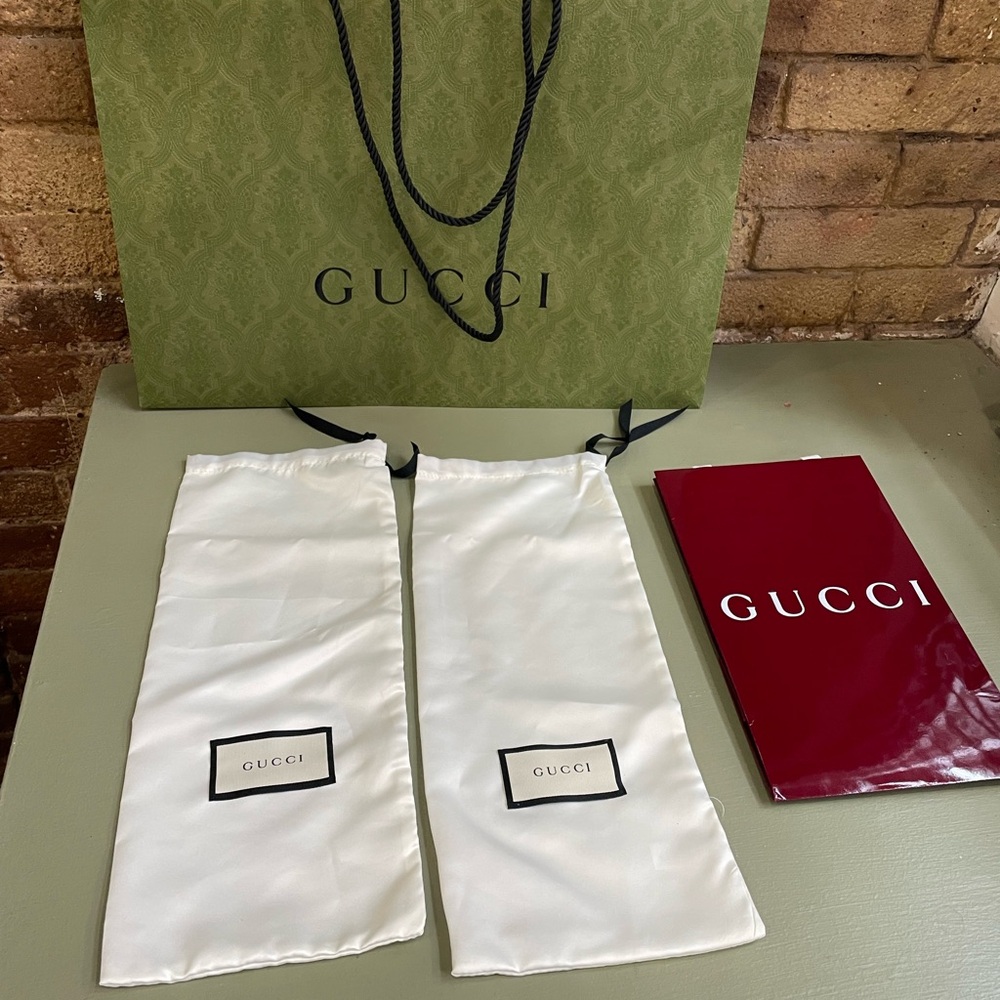 2 Gucci dust bags and shopping bags
